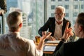 Group of business People Meeting  in office on window . marketing team Conference Brainstorming with senior executive manager. Royalty Free Stock Photo