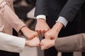 Group of business people putting their fists success for dealing,Team work to achieve goals,Hand coordination Royalty Free Stock Photo