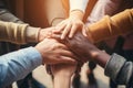 Group of business people putting their hands together on top of each other, A group of diverse hands holding each other in support Royalty Free Stock Photo