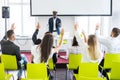 Group of business people raise hands up to agree with speaker in the meeting room seminar. Business meeting Royalty Free Stock Photo