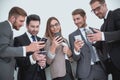 Group of business people reading a message on phones Royalty Free Stock Photo