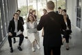 Group of business people sitting on conference together listening to the speaker giving a speech in the meeting room seminar  The Royalty Free Stock Photo