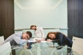 Group of business people sleeping in meeting room with blank pic Royalty Free Stock Photo