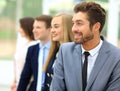 Group of business people smiling in an office Royalty Free Stock Photo