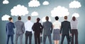 Group of business people standing in front of clouds graphics Royalty Free Stock Photo