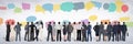 Group of business people standing in front of colorful chat bubbles Royalty Free Stock Photo