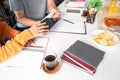 Group of business people talking about project and prepare pizza and potato chips for having lunch in corporate together in office Royalty Free Stock Photo