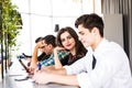 Group of business people using digital devices. Team People working at their table in modern office Royalty Free Stock Photo