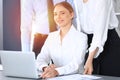 Group of business people using laptop computer in office. Meeting and teamwork concept Royalty Free Stock Photo