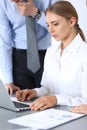 Group of business people using laptop computer in office. Meeting and teamwork concept Royalty Free Stock Photo