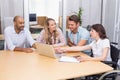 Group of business people using tablet computer and laptop Royalty Free Stock Photo