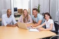 Group of business people using tablet computer and laptop Royalty Free Stock Photo