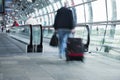 Group of business people walking at airport, real people Royalty Free Stock Photo