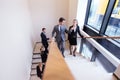 Group of business people walking at stairs Royalty Free Stock Photo