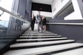 Group of business people walking at stairs Royalty Free Stock Photo