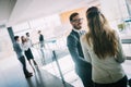 Group of business people walking and taking at stairs in an office Royalty Free Stock Photo