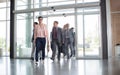 Group of business people on the way in building Royalty Free Stock Photo