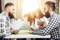 Group of business people working on laptop in cafe Royalty Free Stock Photo