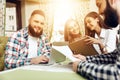 Group of business people working on laptop in cafe Royalty Free Stock Photo