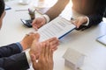 Group of business peoples signing contract and hands clap after successful planning project