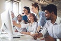 Group of business professionals having a meeting. Diverse group of designers smiling at the office. Royalty Free Stock Photo