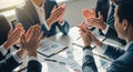 Business People Clapping Hands in Meeting Around Table Royalty Free Stock Photo