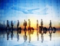 Group of Business Travelers Walking in an Airport