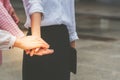 group of business women, coordinating hand