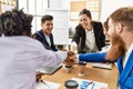 Group of business workers smiling happy celebrating with hands together at the office Royalty Free Stock Photo