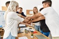 Group of business workers smiling happy celebrating with hands together at the office Royalty Free Stock Photo