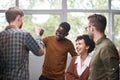 Businessman giving high five to his partner in office Royalty Free Stock Photo