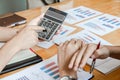 Group businessman hand using calculator Calculating bonusOr other compensation to employees to increase productivity. Royalty Free Stock Photo