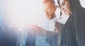 Group of businessmans on meeting.Business team in working process.Double exposure,skyscraper building blurred background Royalty Free Stock Photo