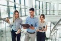 Businessmen and businesswomen walking and taking stairs in an office building Royalty Free Stock Photo