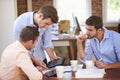 Group Of Businessmen Meeting To Discuss Ideas Royalty Free Stock Photo