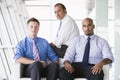 Group of businessmen sitting in lobby