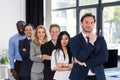 Group Of Businesspeople In Creative Office With Male Leader On Foreground Businessmen And Businesswomen Successful Team Royalty Free Stock Photo