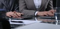 Group of businesspeople or lawyers at meeting. Low key lighting Royalty Free Stock Photo