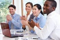 Group Of Businesspeople Meeting Around Boardroom Table Royalty Free Stock Photo