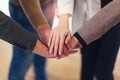 Group of businesspeople putting their hands on top of each other Royalty Free Stock Photo