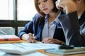 Group of businesswoman discussing on stockmarket charts in office