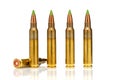 A group of 5.56 callibar, green tip bullets ordered into the line