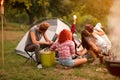 Group of campers photographing selfie in nature