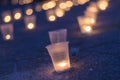 A group of candles burning in street. Day of Remembrance for the Bereaved