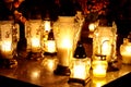 Group of candles on grave during All Saint's Day Royalty Free Stock Photo