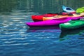 Group of canoes on the lake in the hot summer at children`s summer school