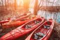 Group of canoes rental kayak on the lake shore beach Royalty Free Stock Photo