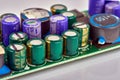 Group of capacitors different sizes on boards Royalty Free Stock Photo