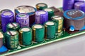 Group of capacitors different sizes on boards