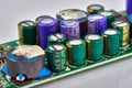 Group of capacitors different sizes on boards Royalty Free Stock Photo